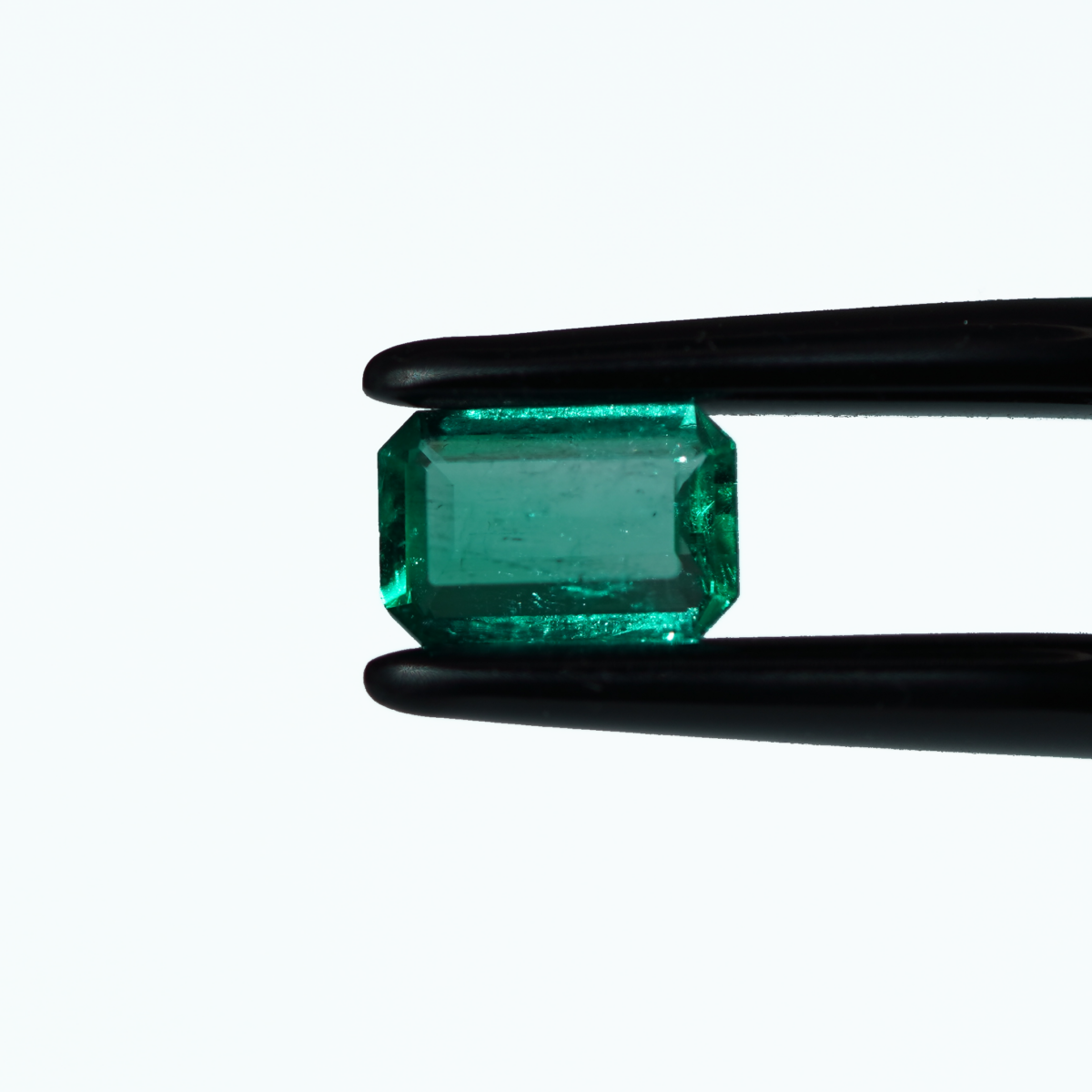 0,71 ct Muzo Emerald Cut