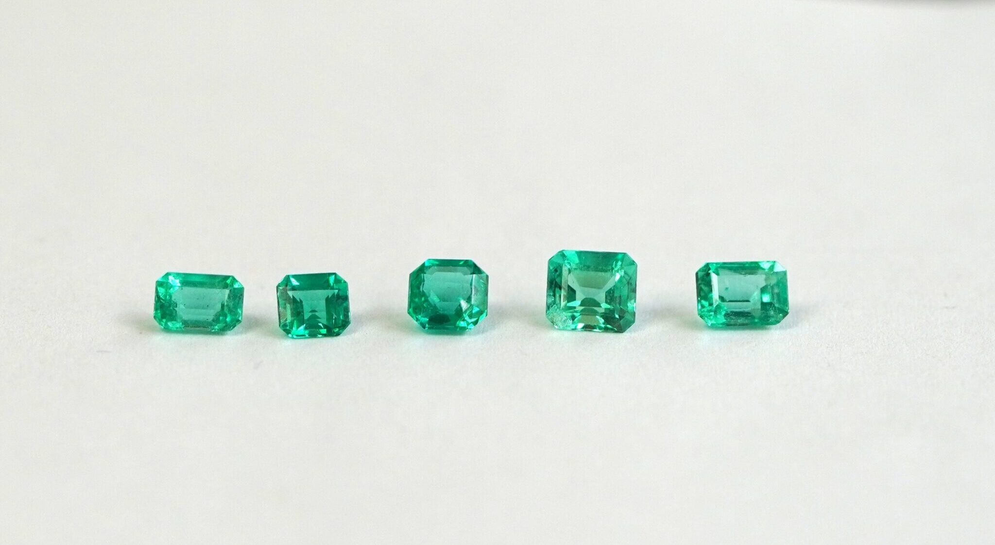 What Is The Difference Between A High Quality Emerald And A Comercial Emerald ?